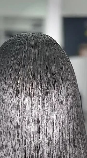 Silky straight hair after keratin treatment at Stylin'Chic